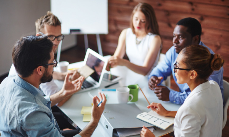 Group of business people having a meeting